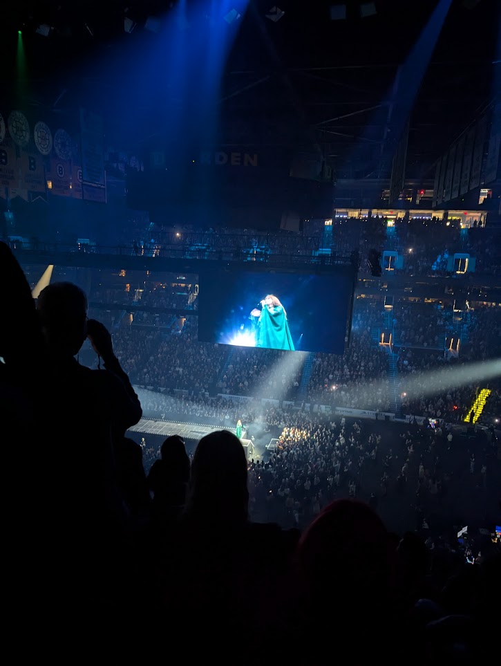 An image of Florence on the screen hanging in TD Garden. Smaller Florence is in the picture below it.