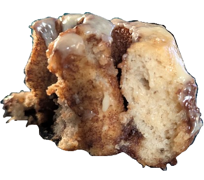 A photo of half a cinnamon roll showing the crumb structure. It looks normal and not dry and crumbly like a lot of gluten-free pastries.